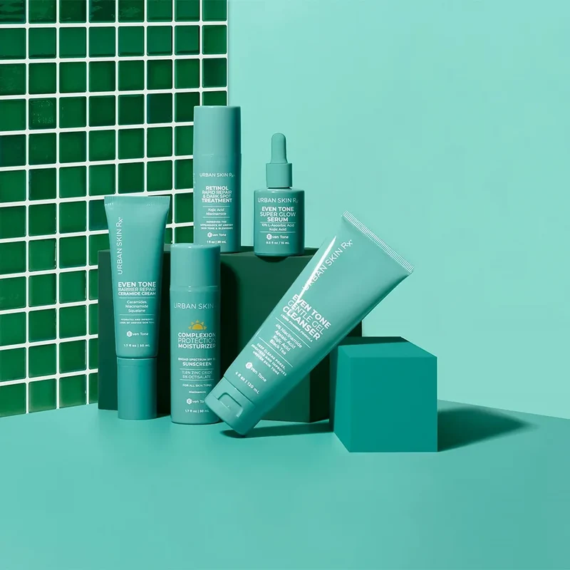 Urban Skin Rx skincare range on a teal set